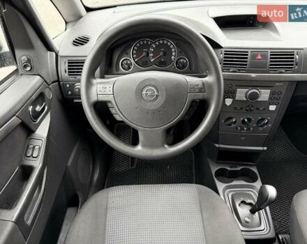 Синий Опель Мерива, объемом двигателя 1.6 л и пробегом 142 тыс. км за 3950 $, фото 73 на Automoto.ua