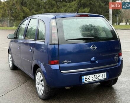 Синий Опель Мерива, объемом двигателя 1.6 л и пробегом 142 тыс. км за 3950 $, фото 26 на Automoto.ua