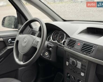 Синий Опель Мерива, объемом двигателя 1.6 л и пробегом 142 тыс. км за 3950 $, фото 43 на Automoto.ua