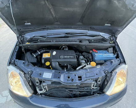 Синий Опель Мерива, объемом двигателя 1.69 л и пробегом 262 тыс. км за 3550 $, фото 34 на Automoto.ua