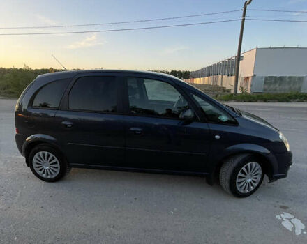 Синий Опель Мерива, объемом двигателя 1.69 л и пробегом 262 тыс. км за 3550 $, фото 11 на Automoto.ua