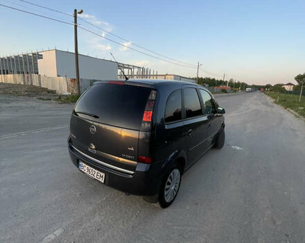 Синий Опель Мерива, объемом двигателя 1.69 л и пробегом 262 тыс. км за 3550 $, фото 13 на Automoto.ua