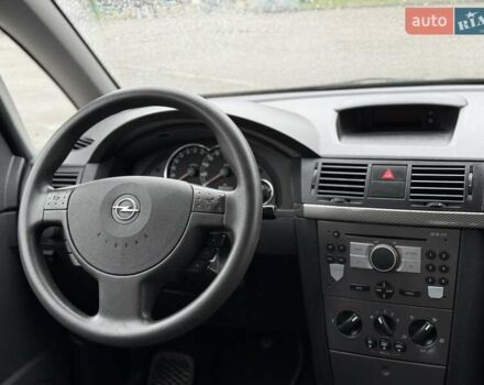 Синий Опель Мерива, объемом двигателя 1.6 л и пробегом 142 тыс. км за 3950 $, фото 68 на Automoto.ua