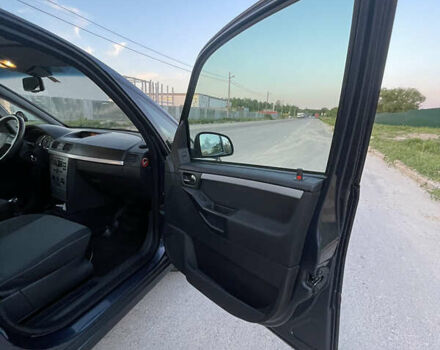 Синий Опель Мерива, объемом двигателя 1.69 л и пробегом 262 тыс. км за 3550 $, фото 27 на Automoto.ua