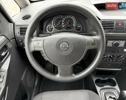 Синий Опель Мерива, объемом двигателя 1.6 л и пробегом 142 тыс. км за 3950 $, фото 74 на Automoto.ua