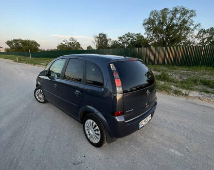 Синий Опель Мерива, объемом двигателя 1.69 л и пробегом 262 тыс. км за 3550 $, фото 10 на Automoto.ua