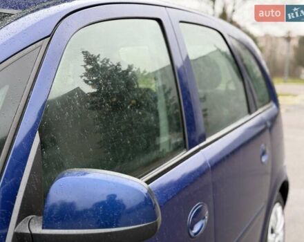 Синий Опель Мерива, объемом двигателя 1.6 л и пробегом 142 тыс. км за 3950 $, фото 9 на Automoto.ua