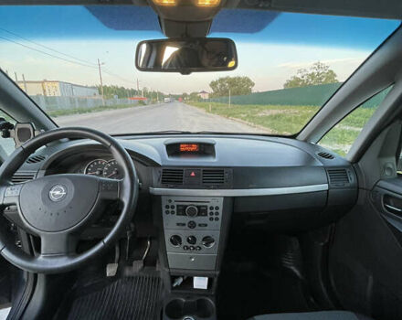 Синий Опель Мерива, объемом двигателя 1.69 л и пробегом 262 тыс. км за 3550 $, фото 21 на Automoto.ua