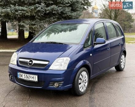 Синий Опель Мерива, объемом двигателя 1.6 л и пробегом 142 тыс. км за 3950 $, фото 1 на Automoto.ua