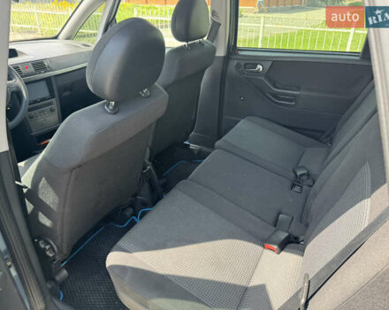 Синий Опель Мерива, объемом двигателя 1.6 л и пробегом 300 тыс. км за 3500 $, фото 9 на Automoto.ua