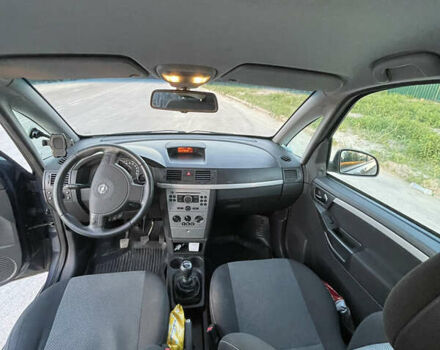 Синий Опель Мерива, объемом двигателя 1.69 л и пробегом 262 тыс. км за 3550 $, фото 19 на Automoto.ua