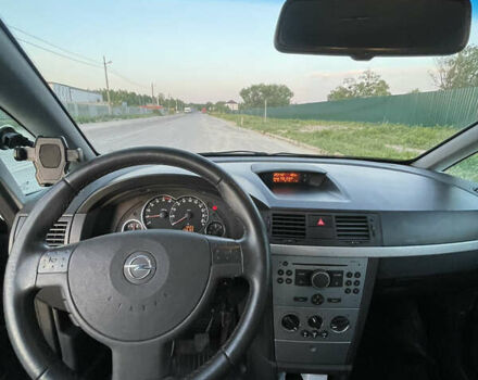 Синий Опель Мерива, объемом двигателя 1.69 л и пробегом 262 тыс. км за 3550 $, фото 32 на Automoto.ua