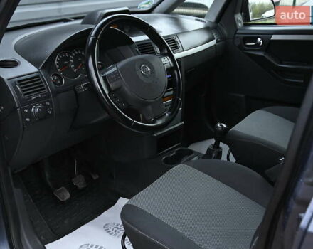 Синий Опель Мерива, объемом двигателя 1.6 л и пробегом 268 тыс. км за 3999 $, фото 14 на Automoto.ua