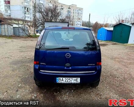 Синий Опель Мерива, объемом двигателя 1.4 л и пробегом 205 тыс. км за 4750 $, фото 5 на Automoto.ua