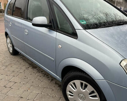 Синий Опель Мерива, объемом двигателя 1.36 л и пробегом 164 тыс. км за 5000 $, фото 2 на Automoto.ua