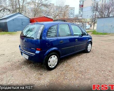 Синий Опель Мерива, объемом двигателя 1.4 л и пробегом 205 тыс. км за 4750 $, фото 3 на Automoto.ua