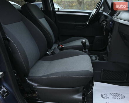 Синий Опель Мерива, объемом двигателя 1.6 л и пробегом 268 тыс. км за 3999 $, фото 31 на Automoto.ua