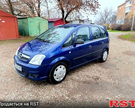 Синий Опель Мерива, объемом двигателя 1.4 л и пробегом 205 тыс. км за 4750 $, фото 4 на Automoto.ua