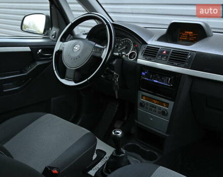 Синий Опель Мерива, объемом двигателя 1.6 л и пробегом 268 тыс. км за 3999 $, фото 26 на Automoto.ua