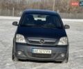 Синий Опель Мерива, объемом двигателя 1.25 л и пробегом 187 тыс. км за 5500 $, фото 3 на Automoto.ua