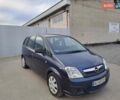 Синий Опель Мерива, объемом двигателя 1.36 л и пробегом 202 тыс. км за 4350 $, фото 1 на Automoto.ua