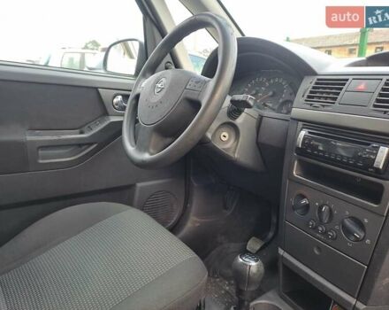 Синий Опель Мерива, объемом двигателя 1.36 л и пробегом 202 тыс. км за 4350 $, фото 14 на Automoto.ua
