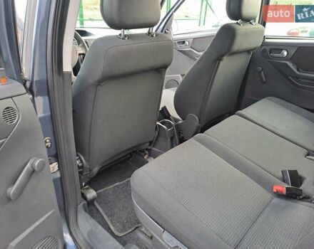 Синий Опель Мерива, объемом двигателя 1.36 л и пробегом 202 тыс. км за 4350 $, фото 17 на Automoto.ua