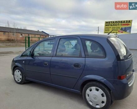 Синий Опель Мерива, объемом двигателя 1.36 л и пробегом 202 тыс. км за 4350 $, фото 13 на Automoto.ua