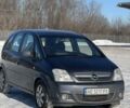 Синий Опель Мерива, объемом двигателя 1.25 л и пробегом 187 тыс. км за 5500 $, фото 2 на Automoto.ua