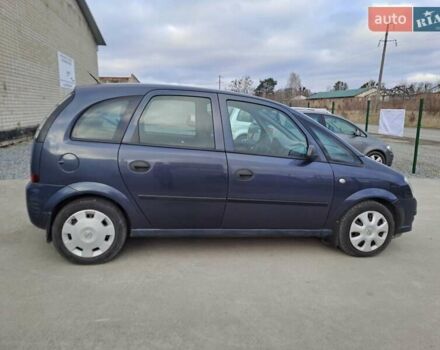 Синий Опель Мерива, объемом двигателя 1.36 л и пробегом 202 тыс. км за 4350 $, фото 12 на Automoto.ua