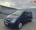 Синий Опель Мерива, объемом двигателя 1.36 л и пробегом 202 тыс. км за 4350 $, фото 1 на Automoto.ua