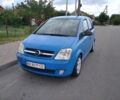 Синий Опель Мерива, объемом двигателя 1.6 л и пробегом 287 тыс. км за 4000 $, фото 1 на Automoto.ua