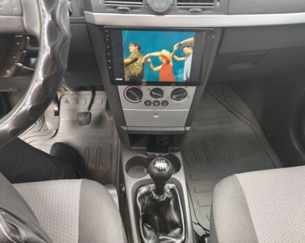 Синий Опель Мерива, объемом двигателя 1.6 л и пробегом 270 тыс. км за 4200 $, фото 7 на Automoto.ua