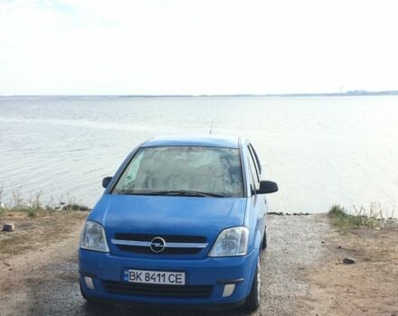 Синий Опель Мерива, объемом двигателя 1.6 л и пробегом 287 тыс. км за 4000 $, фото 1 на Automoto.ua