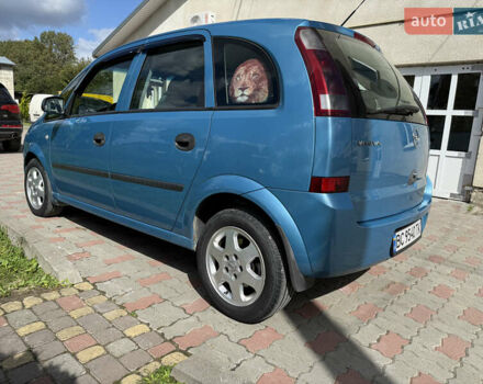 Синий Опель Мерива, объемом двигателя 1.69 л и пробегом 260 тыс. км за 4500 $, фото 5 на Automoto.ua