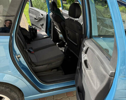 Синий Опель Мерива, объемом двигателя 1.69 л и пробегом 260 тыс. км за 4500 $, фото 16 на Automoto.ua