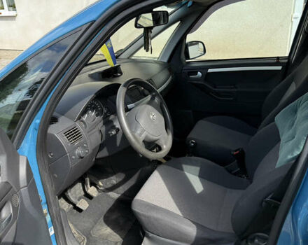 Синий Опель Мерива, объемом двигателя 1.69 л и пробегом 260 тыс. км за 4500 $, фото 11 на Automoto.ua