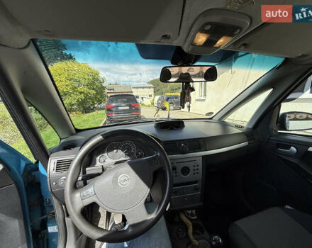 Синий Опель Мерива, объемом двигателя 1.69 л и пробегом 260 тыс. км за 4500 $, фото 19 на Automoto.ua