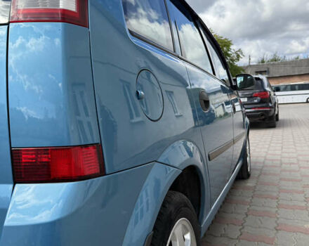 Синий Опель Мерива, объемом двигателя 1.69 л и пробегом 260 тыс. км за 4500 $, фото 8 на Automoto.ua