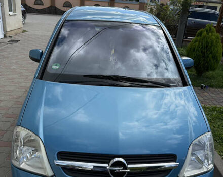 Синий Опель Мерива, объемом двигателя 1.69 л и пробегом 260 тыс. км за 4500 $, фото 9 на Automoto.ua