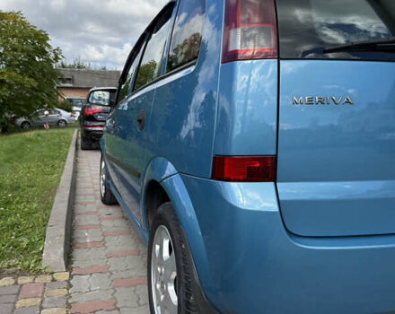Синий Опель Мерива, объемом двигателя 1.69 л и пробегом 260 тыс. км за 4500 $, фото 7 на Automoto.ua