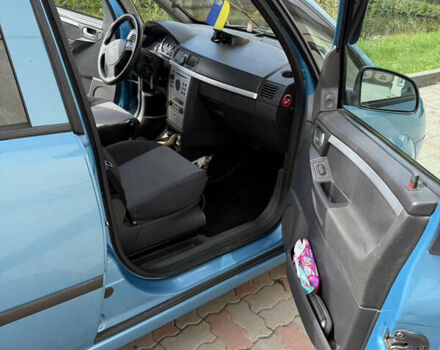 Синий Опель Мерива, объемом двигателя 1.69 л и пробегом 260 тыс. км за 4500 $, фото 15 на Automoto.ua