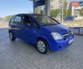 Синий Опель Мерива, объемом двигателя 1.69 л и пробегом 296 тыс. км за 4999 $, фото 2 на Automoto.ua