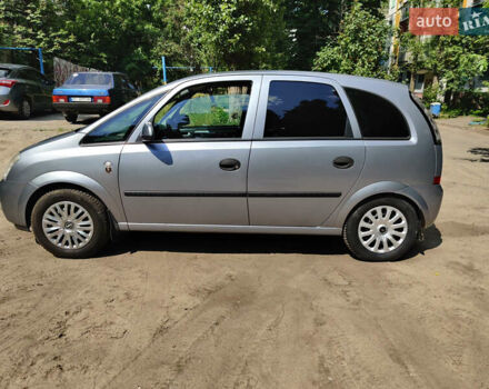 Синий Опель Мерива, объемом двигателя 1.6 л и пробегом 296 тыс. км за 3600 $, фото 2 на Automoto.ua