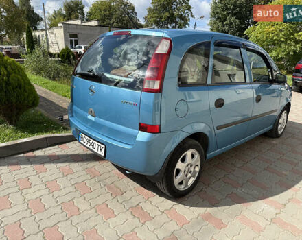 Синий Опель Мерива, объемом двигателя 1.69 л и пробегом 260 тыс. км за 4500 $, фото 3 на Automoto.ua