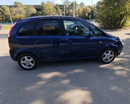 Синий Опель Мерива, объемом двигателя 1.6 л и пробегом 185 тыс. км за 4300 $, фото 26 на Automoto.ua