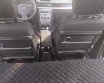 Синий Опель Мерива, объемом двигателя 1.6 л и пробегом 185 тыс. км за 4300 $, фото 29 на Automoto.ua