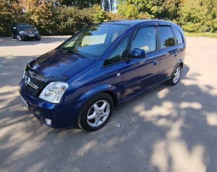 Синий Опель Мерива, объемом двигателя 1.6 л и пробегом 185 тыс. км за 4300 $, фото 11 на Automoto.ua