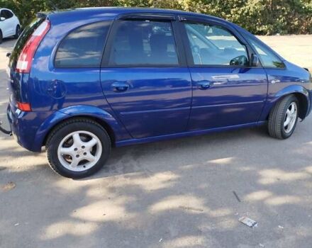 Синий Опель Мерива, объемом двигателя 1.6 л и пробегом 185 тыс. км за 4300 $, фото 8 на Automoto.ua