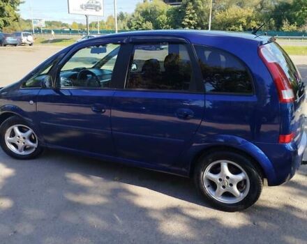 Синий Опель Мерива, объемом двигателя 1.6 л и пробегом 185 тыс. км за 4300 $, фото 5 на Automoto.ua